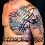 Tribal chest tattoo